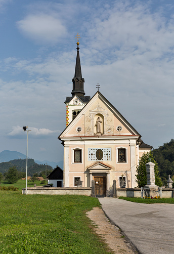 Parish Church of St. Margaret, traditional catholic church in Bohinjska Bela village, near Bled lake, Slovenia.