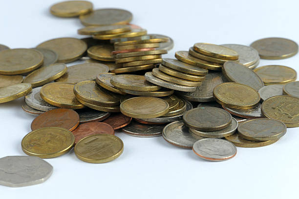istock Pile of coin isolated on white background 621709934