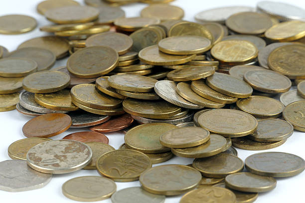 istock Pile of coin isolated on white background 621710042