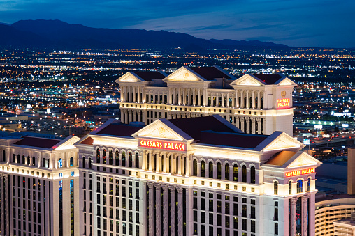 Las Vegas, Nevada, USA - January 10, 2016: Night time aerial view of the neon illuminations of Las Vegas Strip in Nevada. Showing predominantely Caesars Palace Casino and hotel.