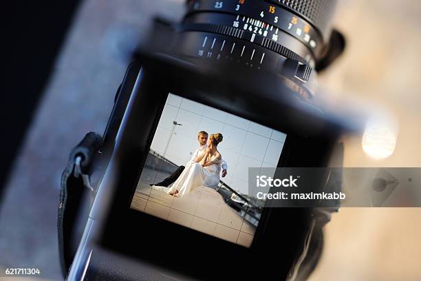 Shooting A Wedding With A Vintage Camera Stock Photo - Download Image Now - Wedding, Photographer, Photography