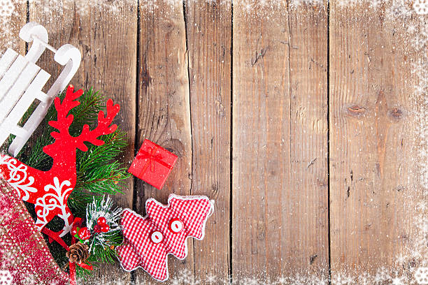 Christmas decoration on wooden plank.