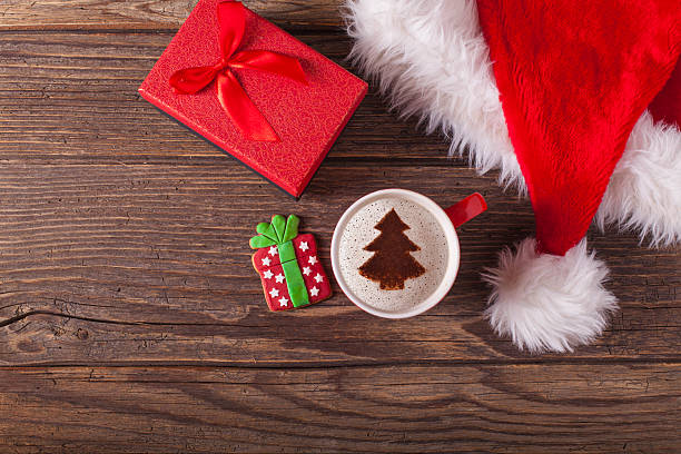 istock Christmas cappuccino and gingerbread cookies 621712938