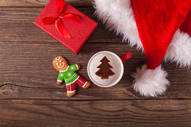 istock Christmas cappuccino and gingerbread cookies 621712974