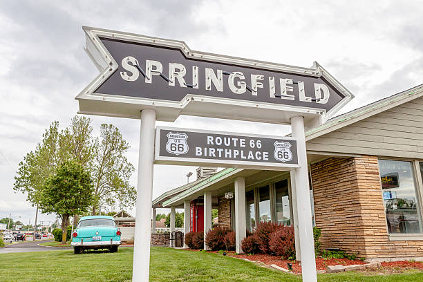 Springfield Missouri, USA- May 18, 2014. Springfield road arrow Springfield Missouri, USA- May 18, 2014. Springfield road arrow sign with cafe background in best western route 66 rail haven. springfield missouri photos stock pictures, royalty-free photos & images