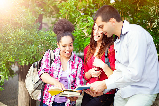 istock Students outdoor with books 621714026