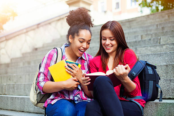 istock Students outdoor with books 621714072