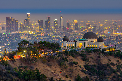 The Griffith Observatory and Los Angeles city skyline at twilight time