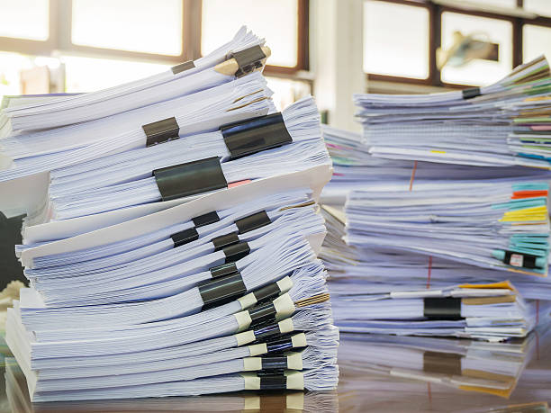 istock Business concept. stack of business documents on office desk 621715112