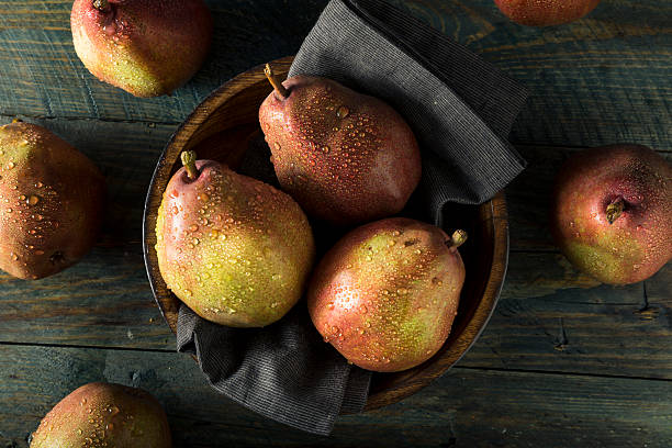 istock Raw Organic Red Anjou Pears 621715660