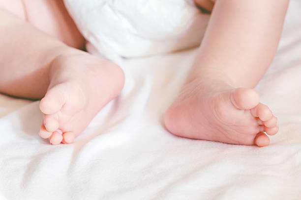 istock New born baby feet 621717784