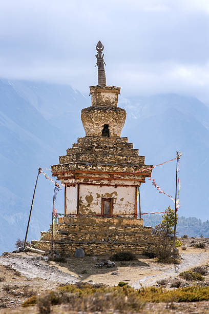 istock Traditional old Buddhist stupa in mountains of Nepal 621722836