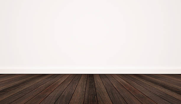 istock hardwood floor and white wall 621723136