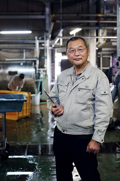 istock Manager of the factory having a tablet 621723204