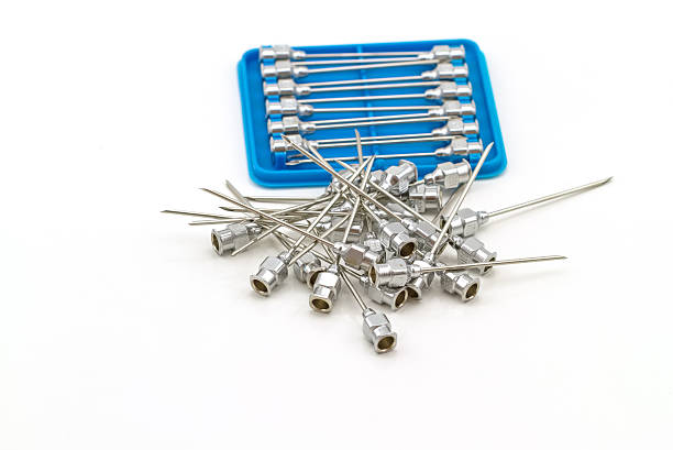 istock Stack of reuse iron needle No.18 G on white background 621724856