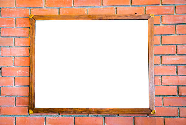 istock Blank wood sign on brick wall 621725286
