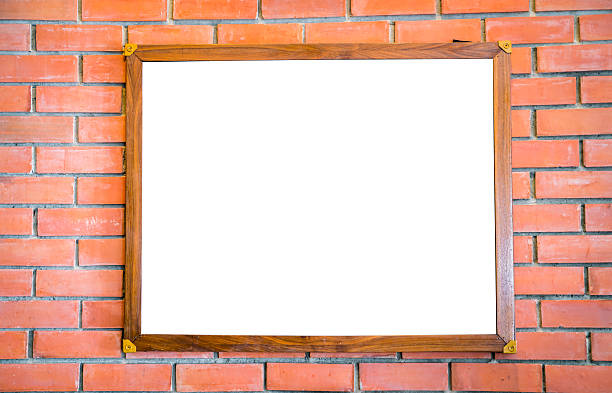 istock Blank wood sign on brick wall 621725790