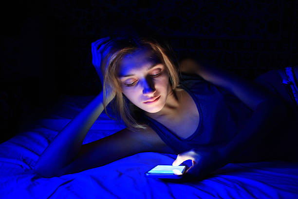 istock young women using the smart phone on bed before sleep 621727026