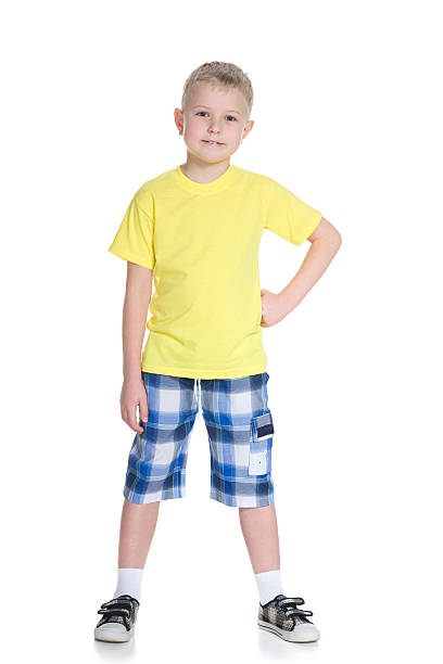 istock Cute blond boy in a yellow shirt 621728002