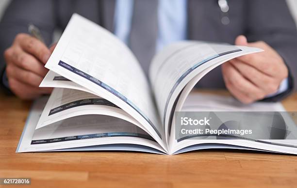Keeping Informed Is The Key To Success Stock Photo - Download Image Now - Brochure, Document, Magazine - Publication