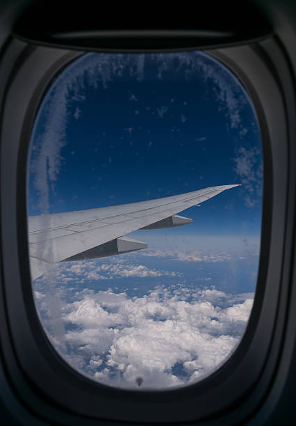 istock Wing of an airplane. 621729000
