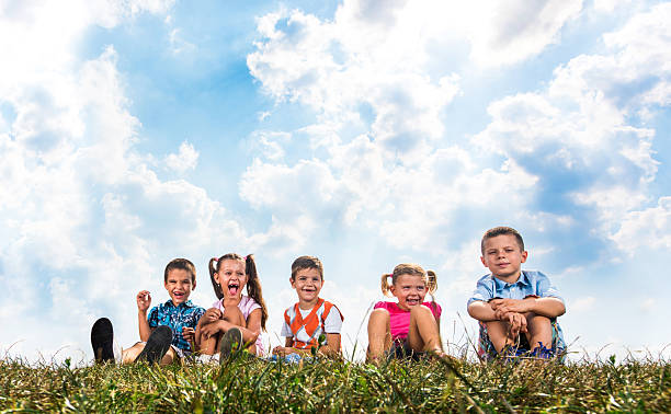 istock Small friends relaxing in grass during spring day. 621729006
