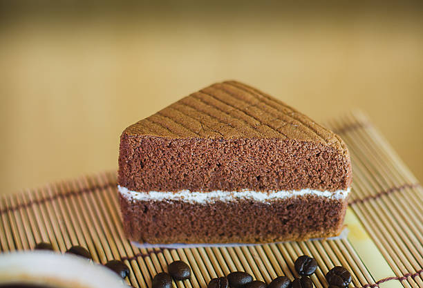 cup of coffee with slice chocolate cake on white background - latté hot chocolate hot drink indulgence imagens e fotografias de stock