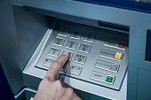 Password code protection Hand on button number Banking automatic