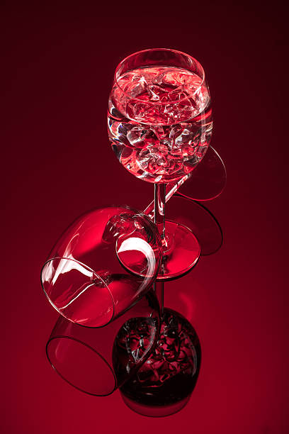 istock Wineglasses On A Black Glass Studio Background 621731862