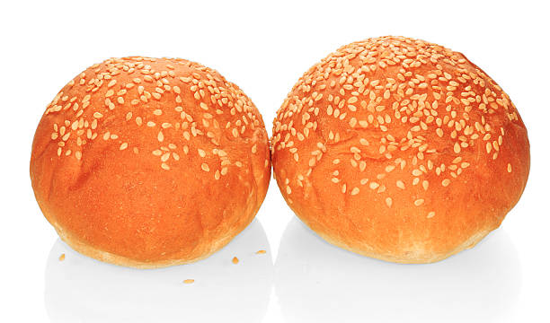istock Two buns with sesame sandwich isolated on white. 621733078