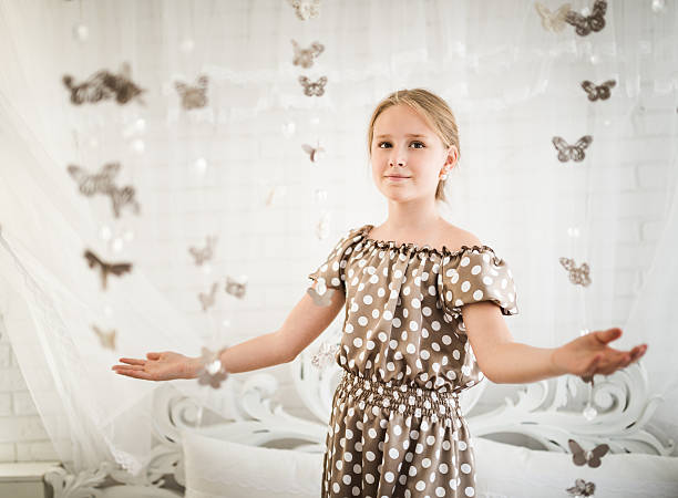 istock Beautiful girl surrounds many butterfly 621816862