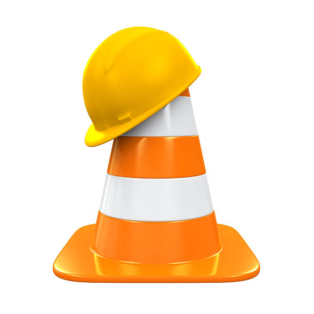 istock Traffic Cone and Safety Helmet 621817526