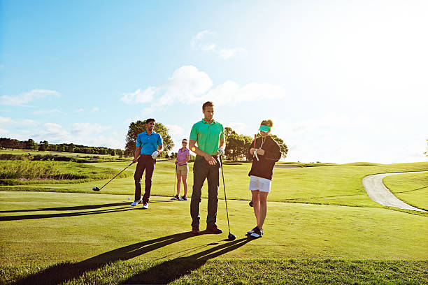 istock Golf is a great game to play with other couples 621820058