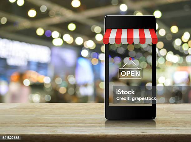 Modern Smart Mobile Phone With On Line Shopping Store Graphic Stock Photo - Download Image Now