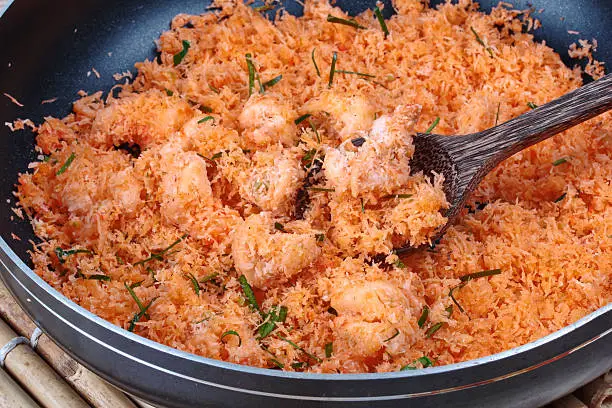 Photo of Cooking stir-fried grated coconut with shrimp for served.