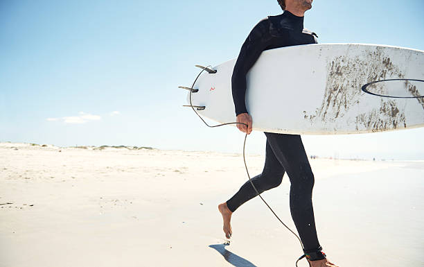 istock Surfing makes you feel young, wild and free 621823462