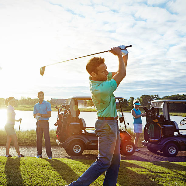 istock Having a swinging good time on the greens 621825746