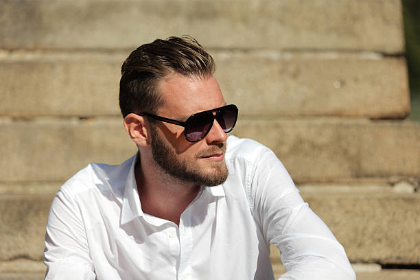 istock Focused man in sunglasses on sunny day 621826654