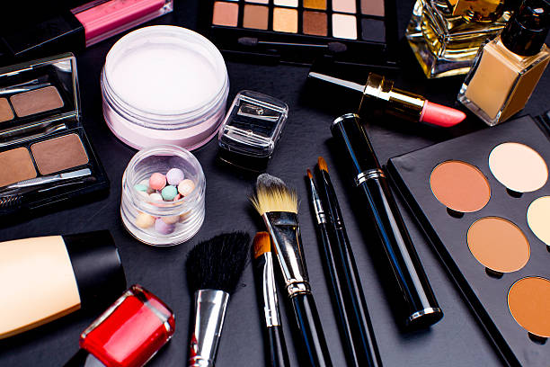 Cosmetics And Beauty Tools On Dark Background Stock Photo - Download Image  Now - Beauty Product, Black Color, Dark - iStock