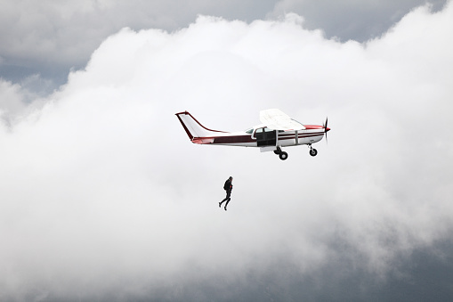 Parachutist jumps from a plane