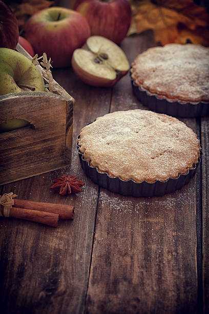 istock Homemade Apple tart with cinnamon and copy space 621834352
