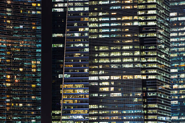 istock Office buildings at night in Singapore. 621834896