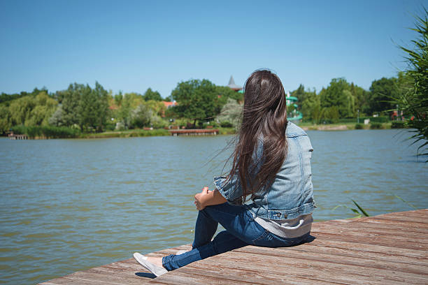 istock Beauty woman relax on pier 621837232