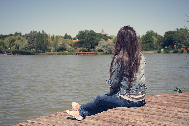 istock Beauty woman relax on pier 621837242