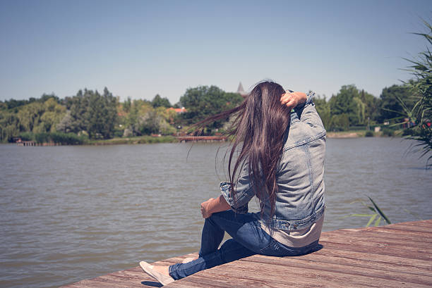 istock Beauty woman relax on pier 621837256