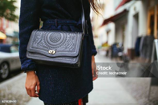 Young Woman Street Style Leather Purse And A Coat Stock Photo - Download Image Now - Purse, Bag, One Woman Only