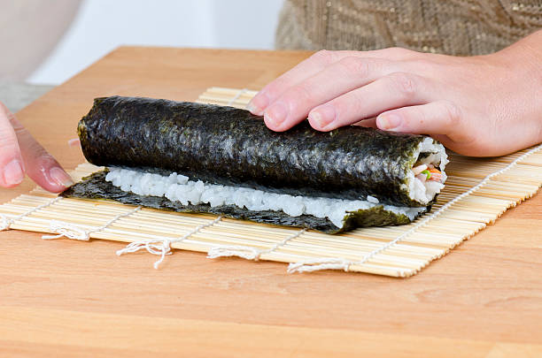 istock Woman is making rolls in her kitchen 621839114