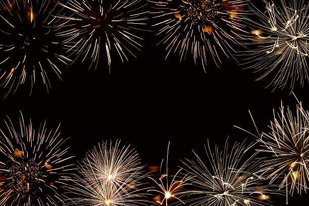 istock Frame of golden fireworks, black night background 621842064