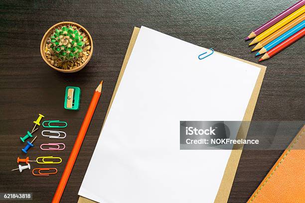 Blank White Paper And Colored Pencil On The Desk Stock Photo - Download Image Now - Top - Garment, Table, Paper