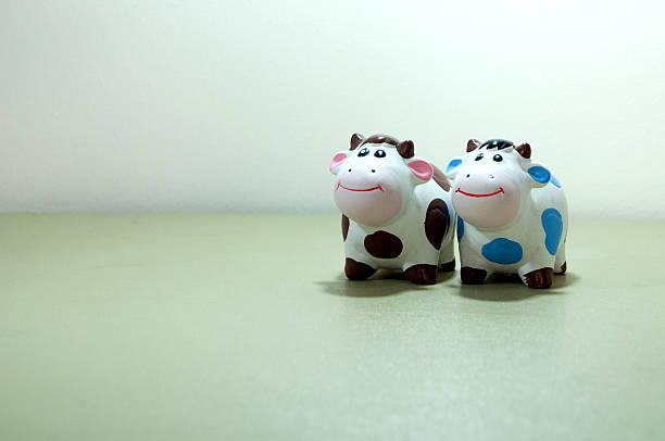 istock Ceramics couple cow doll 621844148